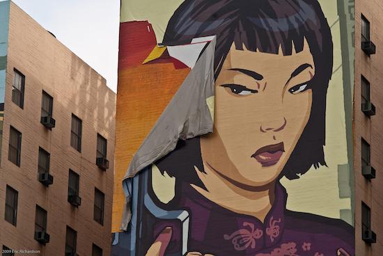 Torn “supergraphic” advertisement in downtown Los Angeles