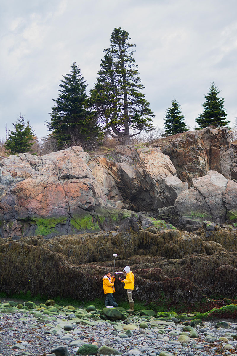 Undergraduate-researchers-Sahana-Simonetti-and-Sophia-Ly-take-precise-location-and-altitude-measurements-with-a-Trimble,-a-sophisticated-GPS-system..jpg