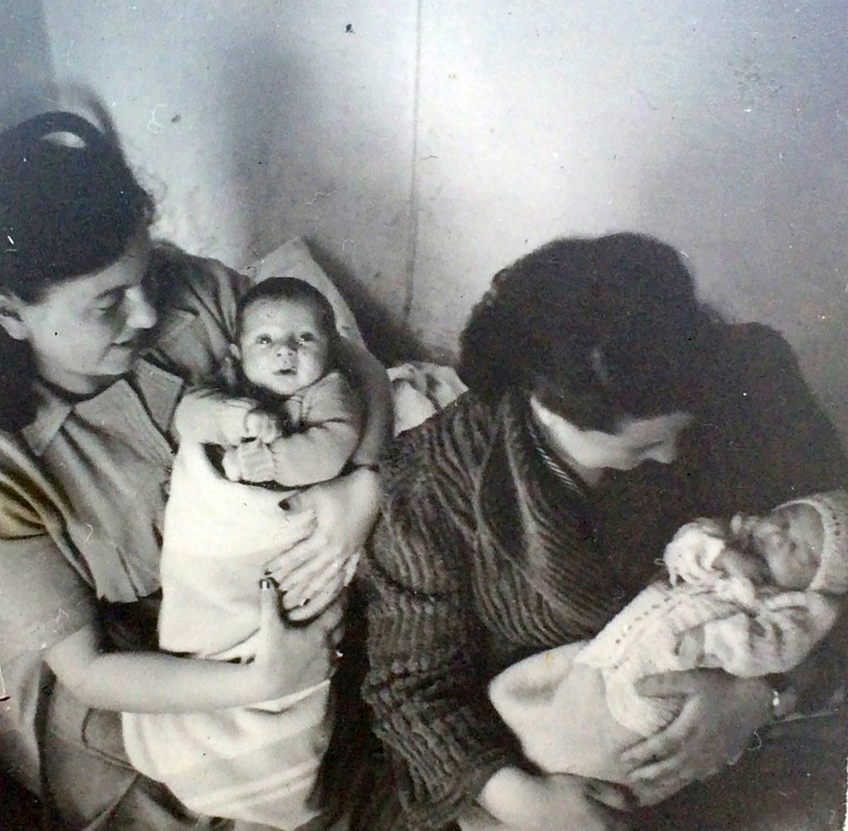 John Glass with his mother on the left side