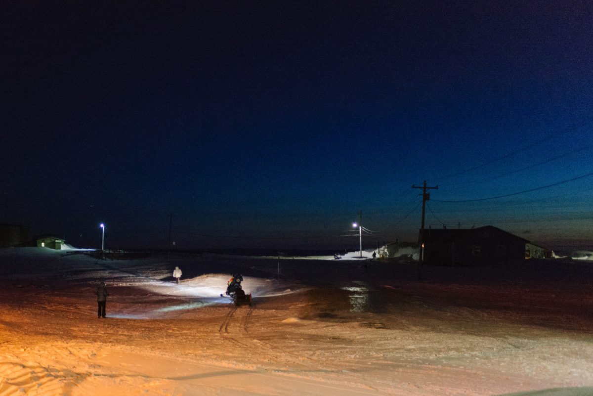 The polar bear patrol practices chasing a faux bear away.